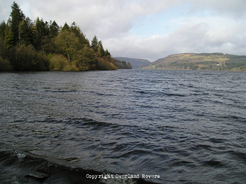 Looking across a lake with hills in the background