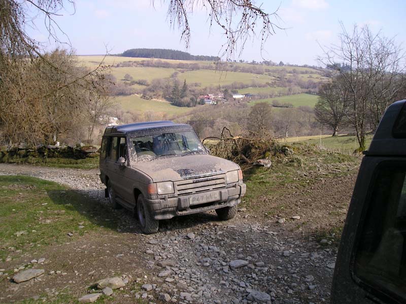 Discovery 1 on a gravel lane