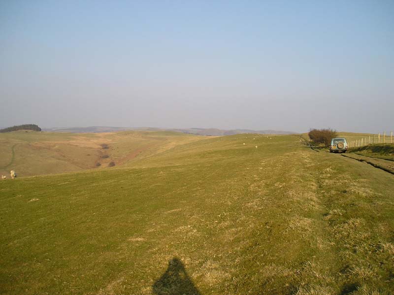 View across Wales, with a Discovery 1 in the distance